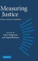 Measuring Justice: Primary Goods and Capabilities